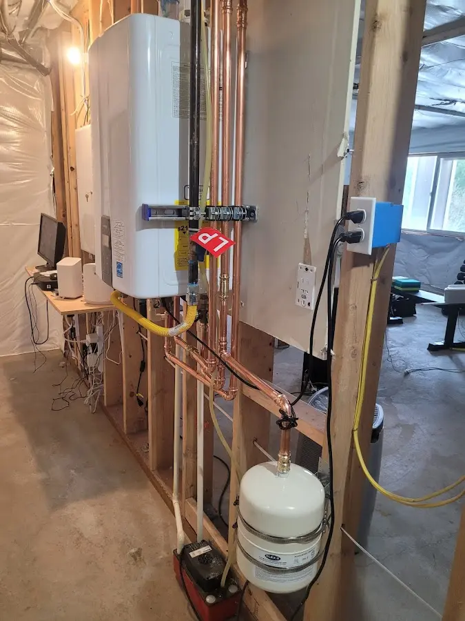 Licensed plumber repairing a kitchen sink in Upper Providence